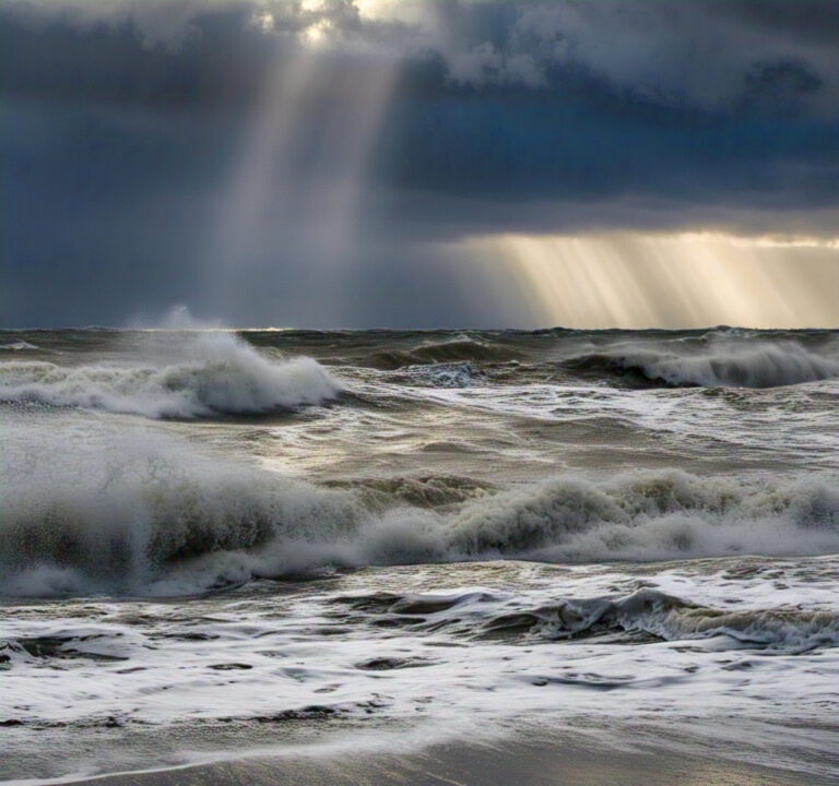 Stormy sea with light rays breaking through—symbolising finding peace in the middle of life’s storms.