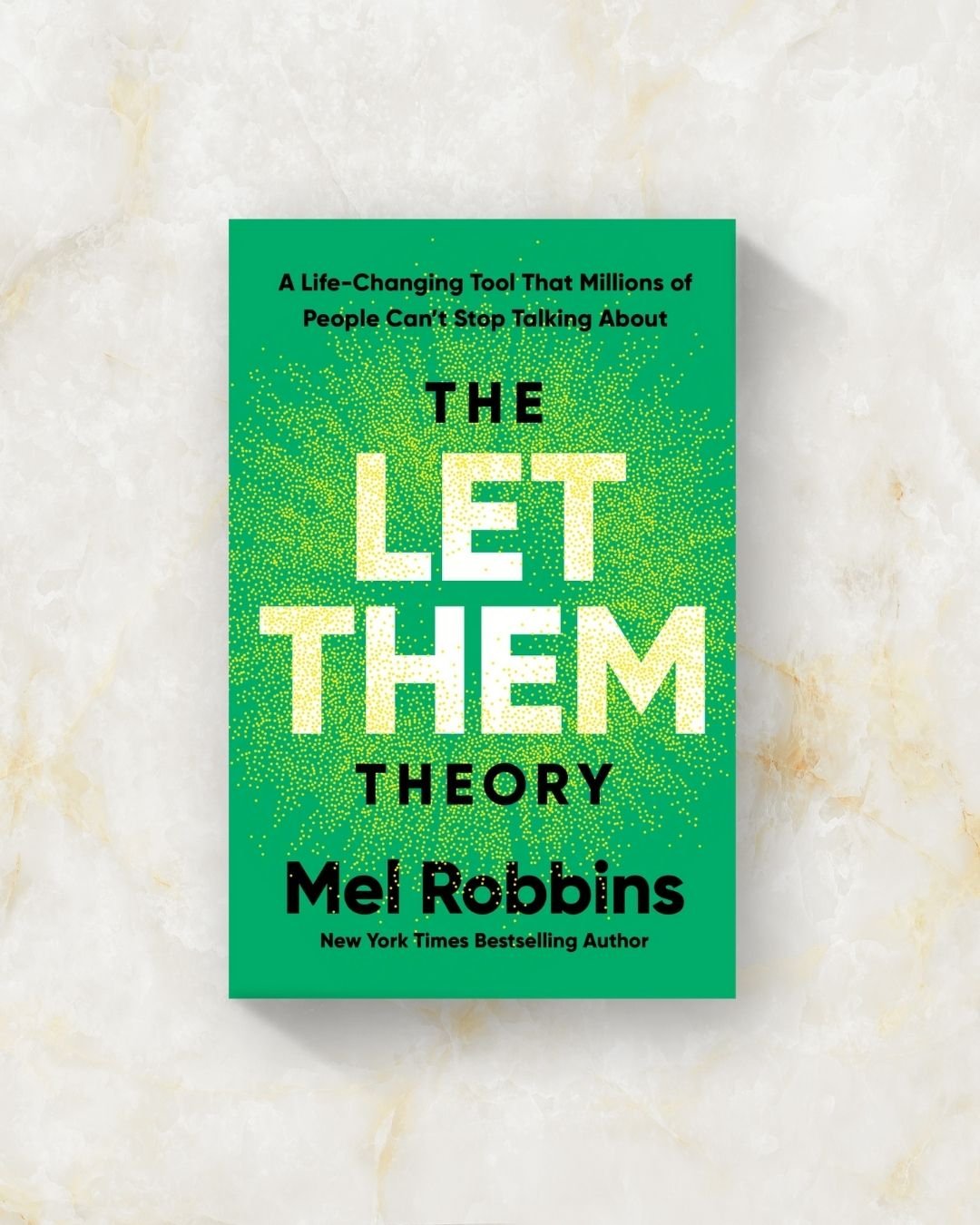 The Let Them Theory by Mel Robbins book cover, symbolizing personal growth and letting go.