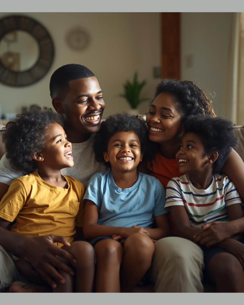 A happy family sitting and smiling. Representing growing up together and the life lessons learned from family.